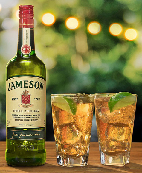 jameson irish whiskey bottle and glasses